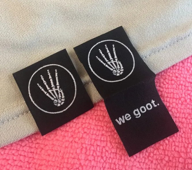 Woven hem tags
